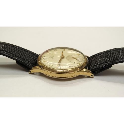 8181 - A mid 20th Century 9ct gold cased Omega gentleman's wristwatch with subsidiary seconds dial, on leat... 