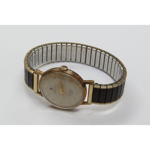 8169 - WITHDRAWN - A 'Verity Magnificent' 9ct gold cased manual wind wristwatch with gold Arabic dial, cent... 