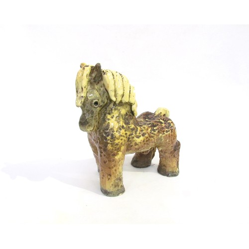 7009 - Unonius Aja for Arabia Pottery, Finland - A ceramic hand built figure of a horse c1930's, textured f... 