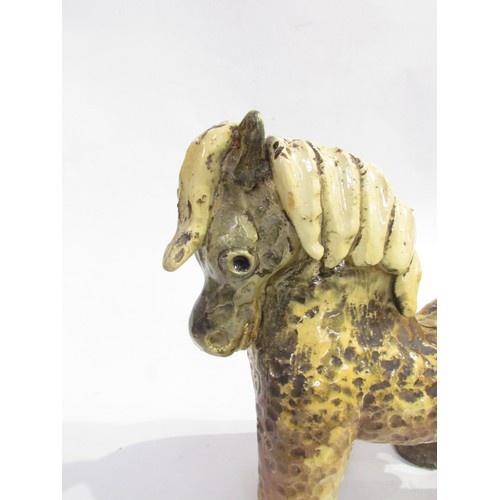 7009 - Unonius Aja for Arabia Pottery, Finland - A ceramic hand built figure of a horse c1930's, textured f... 