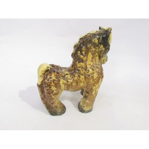 7009 - Unonius Aja for Arabia Pottery, Finland - A ceramic hand built figure of a horse c1930's, textured f... 