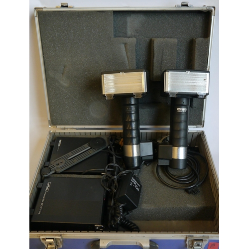 1482 - A blue flight case with 2x Metz 60 CT-1 hammerhead flashes and charges