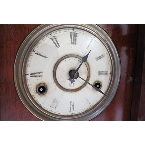 8025 - A late Victorian cottage clock, Roman numeral dial, Pat. July 30th 1878 to face, worn. 39cm high   (... 