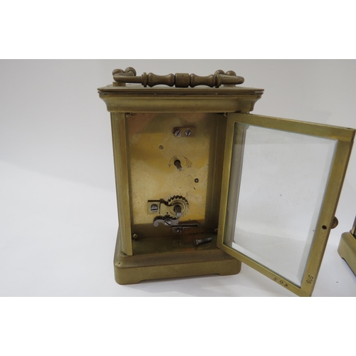 8091 - Two brass carriage clocks including French with bevelled glass