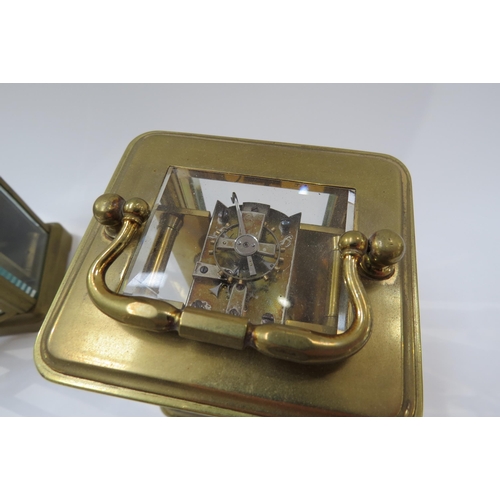 8091 - Two brass carriage clocks including French with bevelled glass