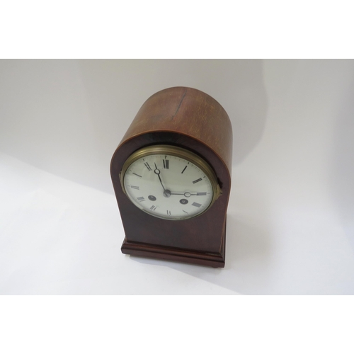 8046 - A French domed top mantel clock with white face Roman numerals. 24cm high   (R) £40 Antiques sale