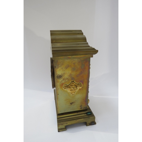 8049 - A late 19th/early 20th Century brass cased French two train mantel clock with Arabic numerals, strik... 