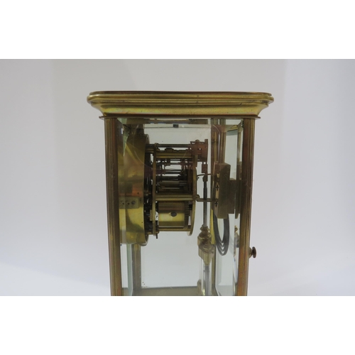 8047 - A four glass French two train mantel clock with mercury pendulum. Striking on a coiled gong. 22.5cm ... 