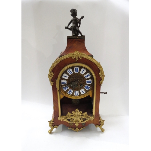 8066 - A late 19th Century French walnut and ormolu mounted striking mantel clock with ROman enamel cartouc... 