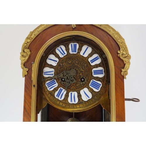 8066 - A late 19th Century French walnut and ormolu mounted striking mantel clock with ROman enamel cartouc... 