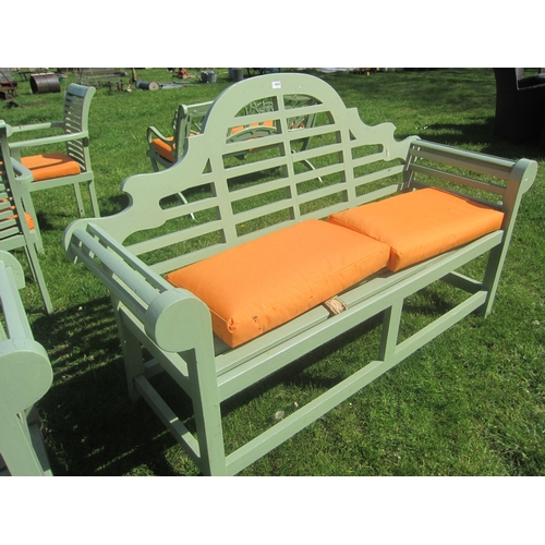 3620 - A green painted teak garden bench A/F with two cushions