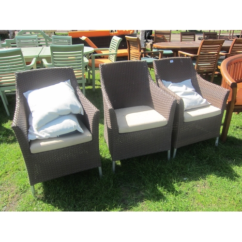 3628 - Three wicker effect garden chairs