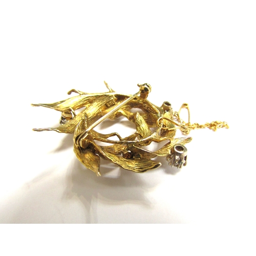 9147 - A 9ct gold leaf form brooch studded with five claw set diamonds 0.80t total approx, 9.2g   (R) £280