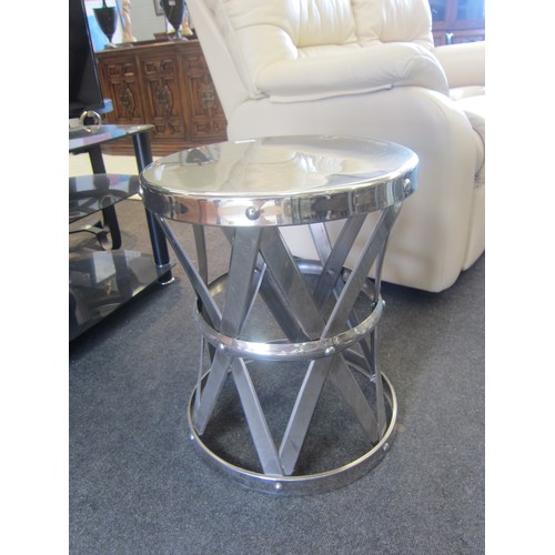 1062A - A chrome occasional table of drum form, 53cm tall x 44cm diameter