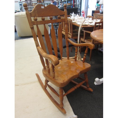 1071 - A modern beech rocking chair