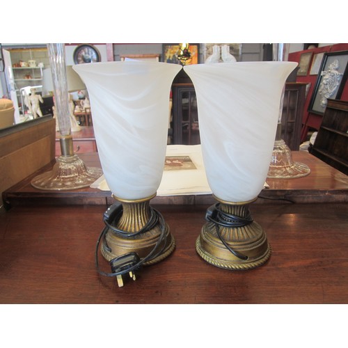 1091A - A pair of classical table lamps, frosted glass up-lighter shades, gilded bases