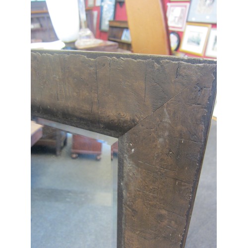 1093 - A dark walnut style framed bevel-edged rectangular wall mirror, 112cm x 92cm  (R)  £15