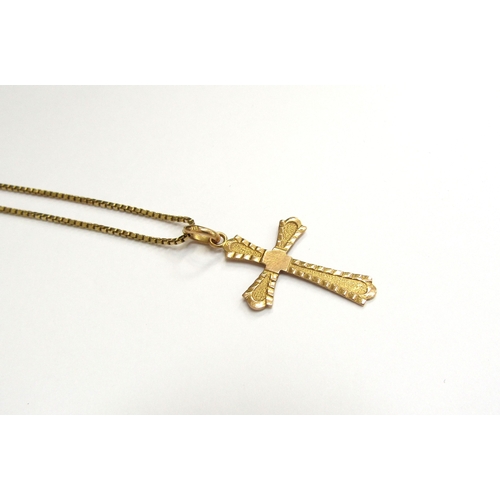 9106 - A gold box chain necklace, 50cm long hung with a gold cross pendant, marks rubbed, 8g