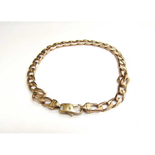 9089 - A 9ct gold flatlink bracelet, 20cm long, 11.9g