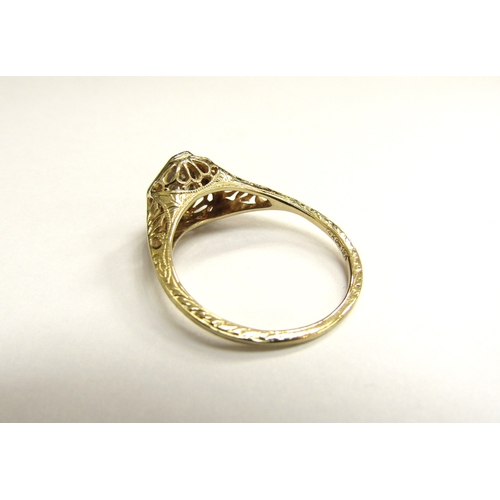 9346 - A gold diamond ring with engraved shank, stamped 14ct and 19ct. Size L/M, 2g                 (C)