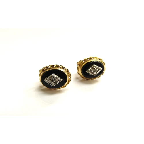 9347 - A pair of onyx and diamond stud earrings, stamped 585, 1.1g                   (C)