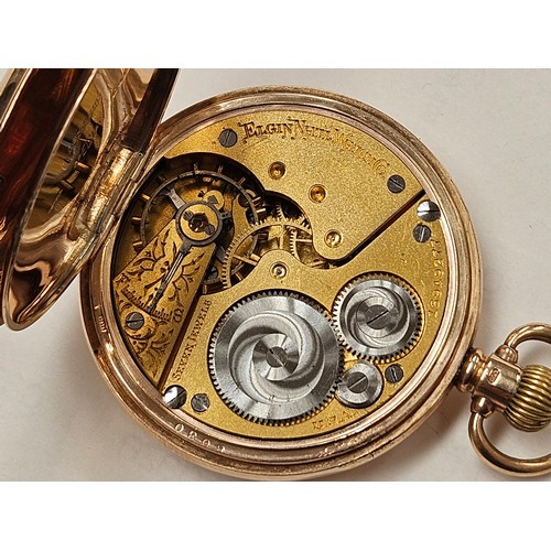 8216 - A 9ct gold cased Elgin full hunter pocket watch, the circular signed dial with Roman numerals, subsi... 