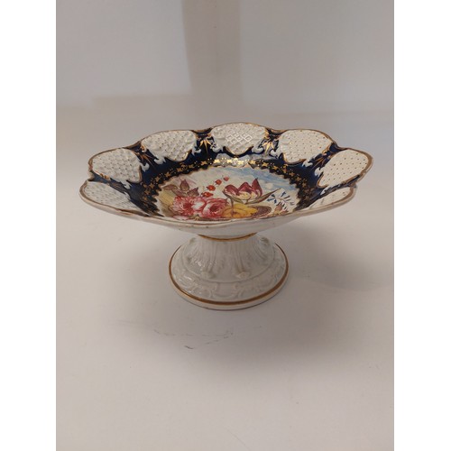 1463 - A Victorian porcelain comport painted with flowers, hairline cracks, 14cm tall x 28cm diameter  (R) ... 