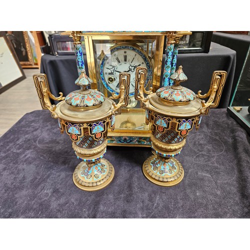 8064 - An early 20th Century highly decorative stirking mantel clock in brass/glazed architectural case wit... 