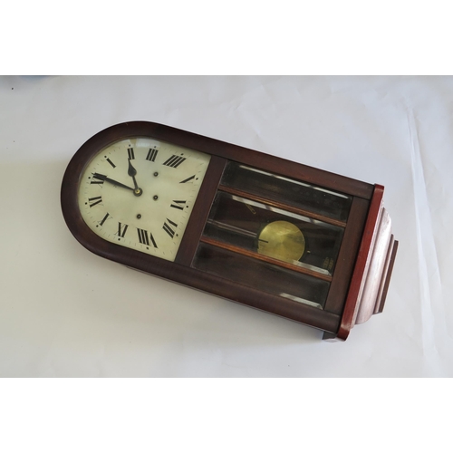 8021 - A mahogany cased Hamburg American Clock company wall clock with a triple glass pane bevel edged door... 