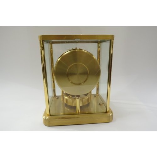 8029 - A Jaeger LoCoultre Atmos Clock no. 601102. Front glass panel is chipped, top case screws missing. 23... 