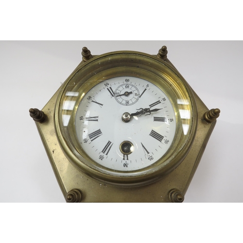 8031 - A 20th Century brass hexagonal form table clock with Roman enamelled dial, one glass panel missing. ... 