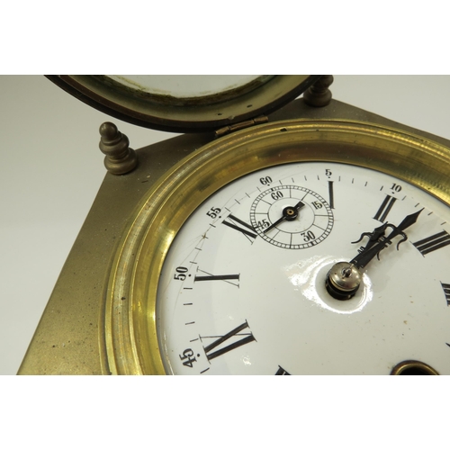 8031 - A 20th Century brass hexagonal form table clock with Roman enamelled dial, one glass panel missing. ... 