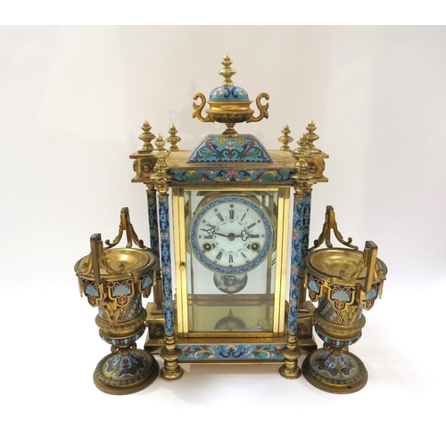 8064 - An early 20th Century highly decorative stirking mantel clock in brass/glazed architectural case wit... 