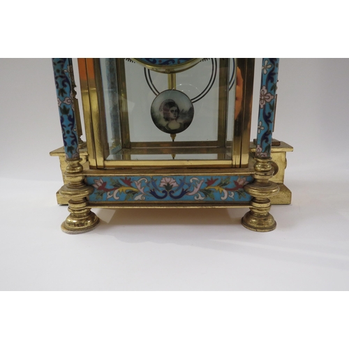 8064 - An early 20th Century highly decorative stirking mantel clock in brass/glazed architectural case wit... 