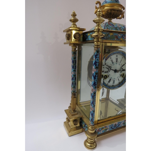 8064 - An early 20th Century highly decorative stirking mantel clock in brass/glazed architectural case wit... 