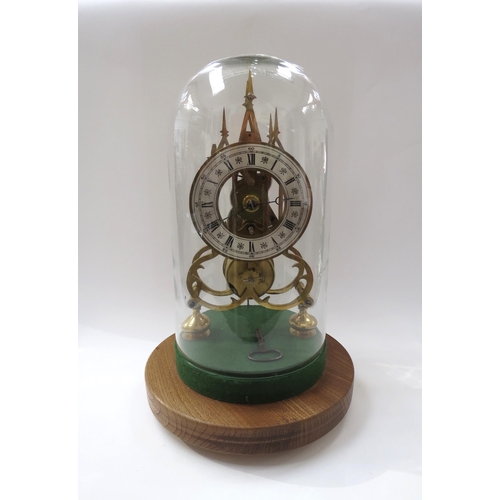 8072 - A 20th Century single fusee skeleton timepiece of Gothic design under glass dome. Roman silvered cha... 