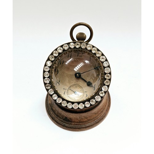 8092 - An American paperweight clock with French movement, Arabic numerals with subsidary seconds dial, vis... 