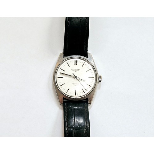 8169A - A Longines Admiral HF wristwatch with baton hour markers, centre seconds and date aperture at 3. On ... 