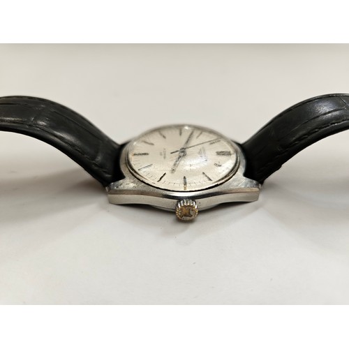 8169A - A Longines Admiral HF wristwatch with baton hour markers, centre seconds and date aperture at 3. On ... 