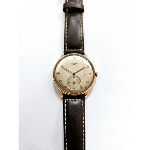 8174 - A vintage Tissot Jumbo gents wristwatch, it has an off-white dial with Arabic numeral hour markers a... 