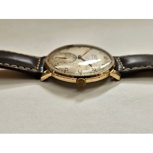 8174 - A vintage Tissot Jumbo gents wristwatch, it has an off-white dial with Arabic numeral hour markers a... 