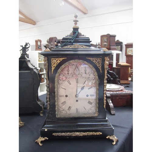 8070 - A 19th Century ebonised bracket clock of large proportions, silvered arched dial with Roman numerals... 