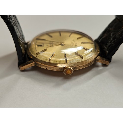 8193 - A Rotary 9ct gold cased manual wind gentleman's wristwatch, champagne dial with date at 6 o' clock, ... 