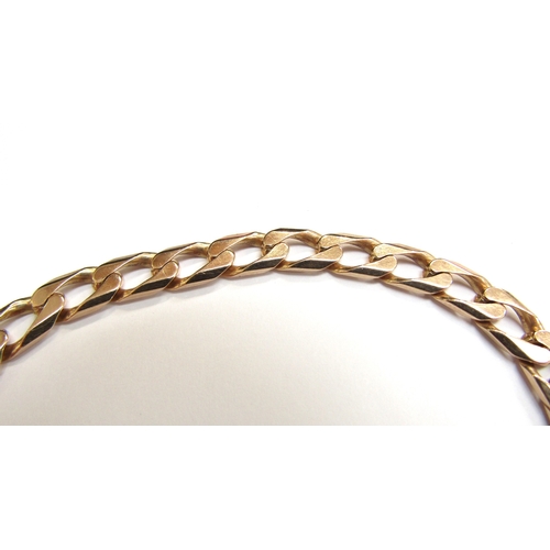 9089 - A 9ct gold flatlink bracelet, 20cm long, 11.9g