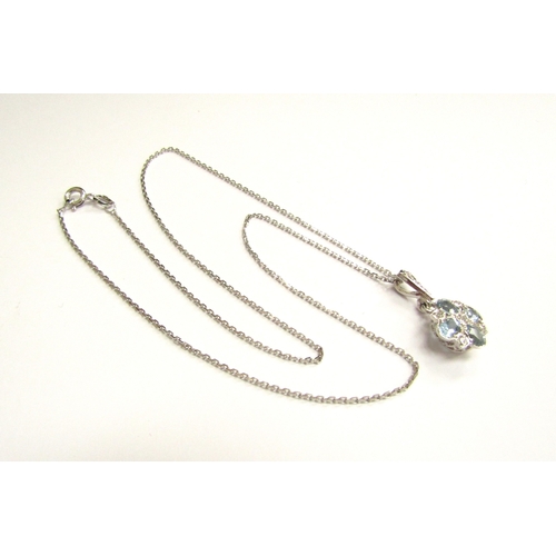 9206 - An 18ct white gold aquamarine and diamond pendant hung on a 9ct white gold chain, 40cm long, 3.3g   ... 