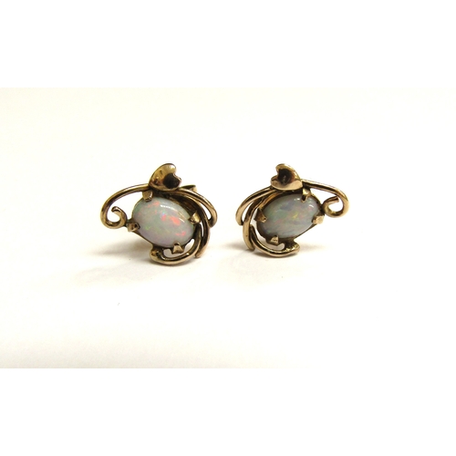 9345 - A pair of gold opal stud earrings, stamped 14k, 1.9g       (C)