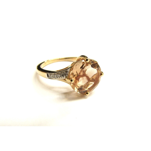 9059 - A 14ct gold morganite and diamond ring. Size N/O, 2.8g