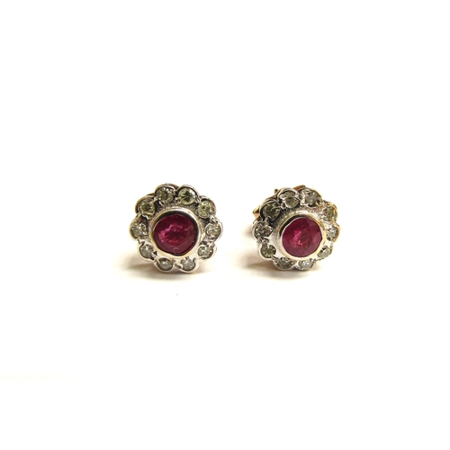 9031 - A pair of ruby and diamond floral stud earrings, 375, 1.3g