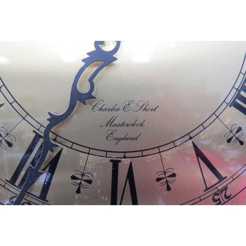 8009 - A modern Charles E Short Masterclock England ‘Tempus Omnia’ longcase clock, Roman numeral dial with ... 