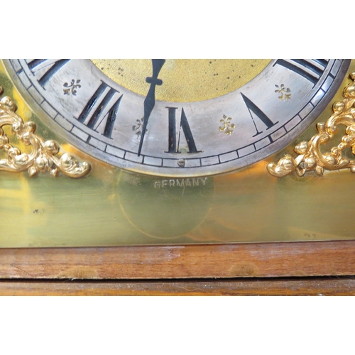 8056 - An early 20th Century oak bracket clock of architectural form. Silvered Roman chapter ring on brass ... 